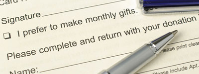 photo of donation form and pen